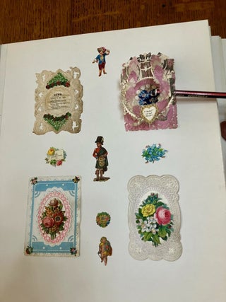 ALBUM OF 19TH CENTURY MOVABLES, LIFT-UPS, CHRISTMAS CARDS AND PRINTED EPHEMERA.