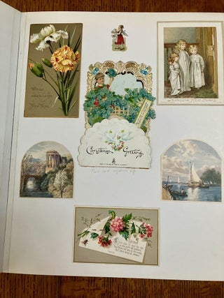 ALBUM OF 19TH CENTURY MOVABLES, LIFT-UPS, CHRISTMAS CARDS AND PRINTED EPHEMERA.
