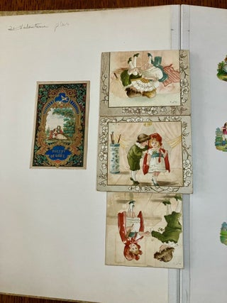 ALBUM OF 19TH CENTURY MOVABLES, LIFT-UPS, CHRISTMAS CARDS AND PRINTED EPHEMERA.