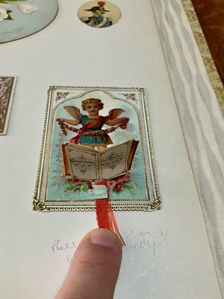 ALBUM OF 19TH CENTURY MOVABLES, LIFT-UPS, CHRISTMAS CARDS AND PRINTED EPHEMERA.